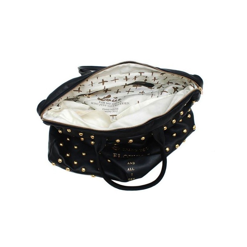 Close-up of gold studs on black Paris House bag
