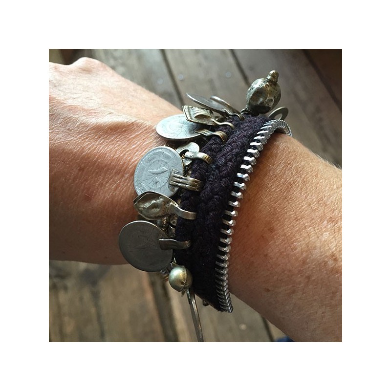 Green Kuchi bracelet worn on wrist