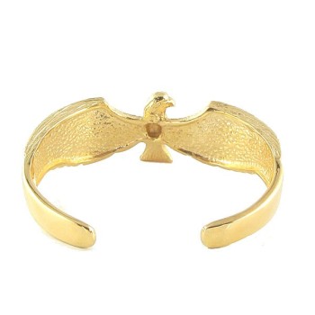 Detail gold eagle bracelet with turquoise stone