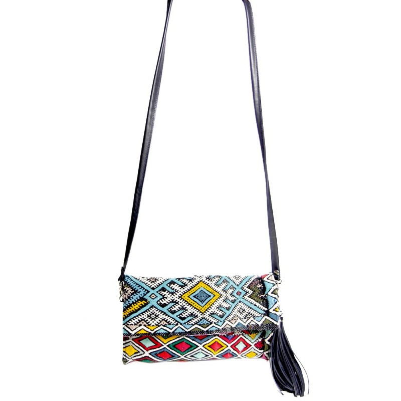 Kilim and leather clutch bag by Maud Fourier Paris