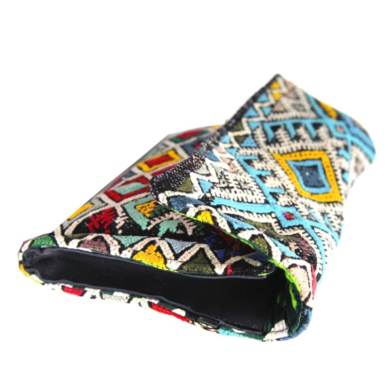 Kilim and leather clutch bag by Maud Fourier Paris