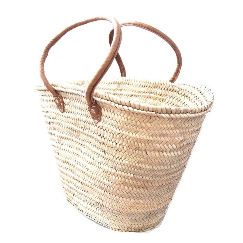 Natural straw beach tote styled for summer beach days